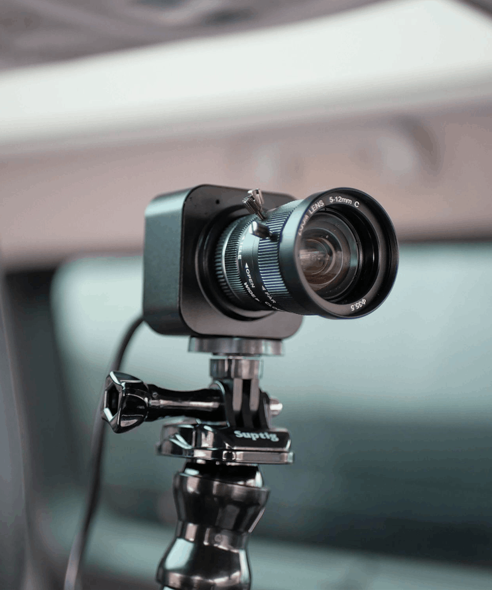 BlackCam 5-12mm zoom camera for BlackBox in a car with headrest mount