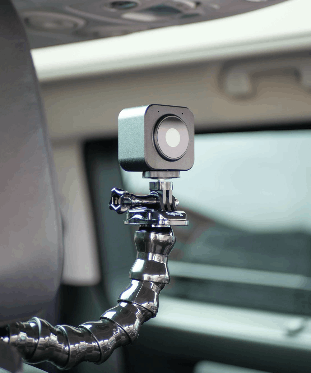 BlackCam autofocus camera for BlackBox in a car with headrest mount