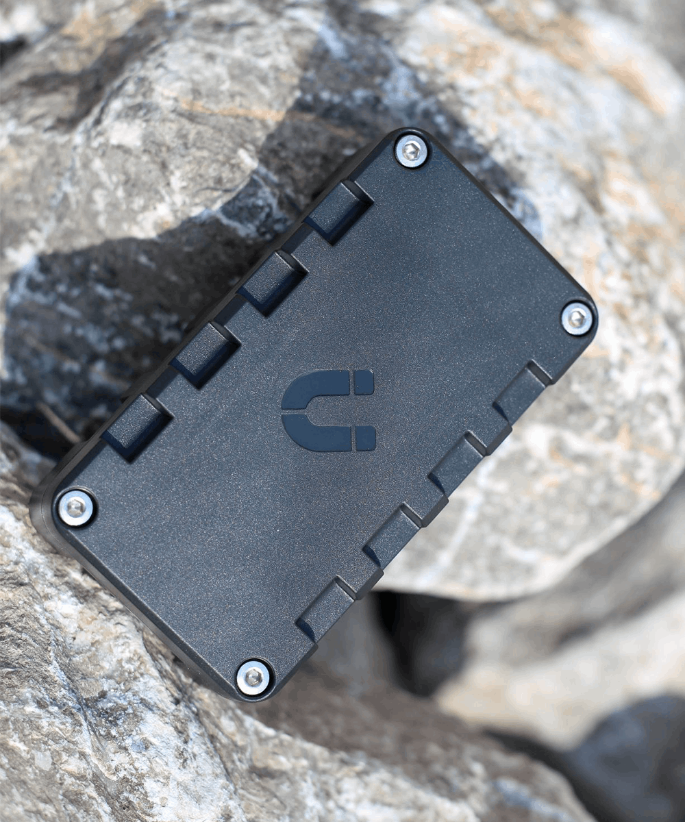 GT7 Pro GPS Tracker on rock