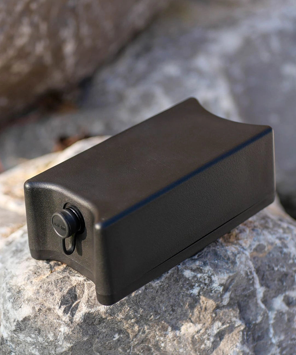 Vehicle GPS Tracker 6700 case on rock